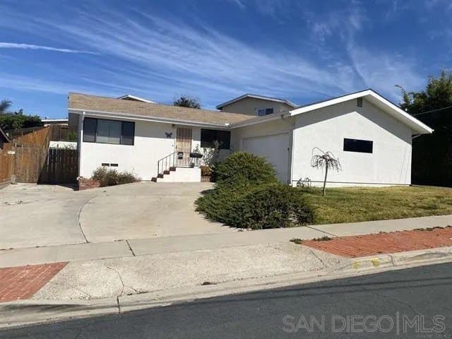 7734 Peacock Dr